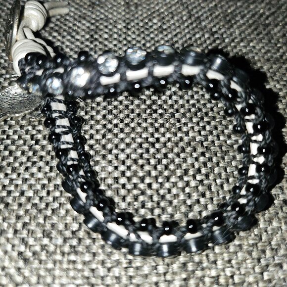Bracelet with Rhinestones Set in Black Beads with White Tie and Turtle Charm - Picture 7 of 9